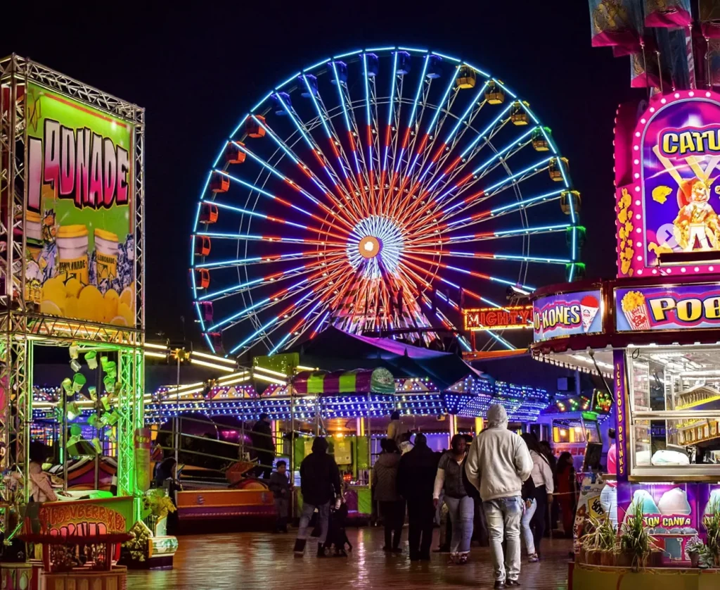 Tiblow Days festival carnival with Ferris wheel and crowd in Bonner Springs Kansas